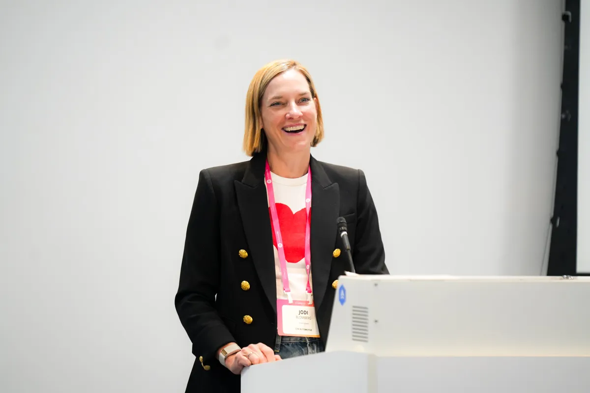 Jodi Blomberg speaking during an AI Loves Data conference session.