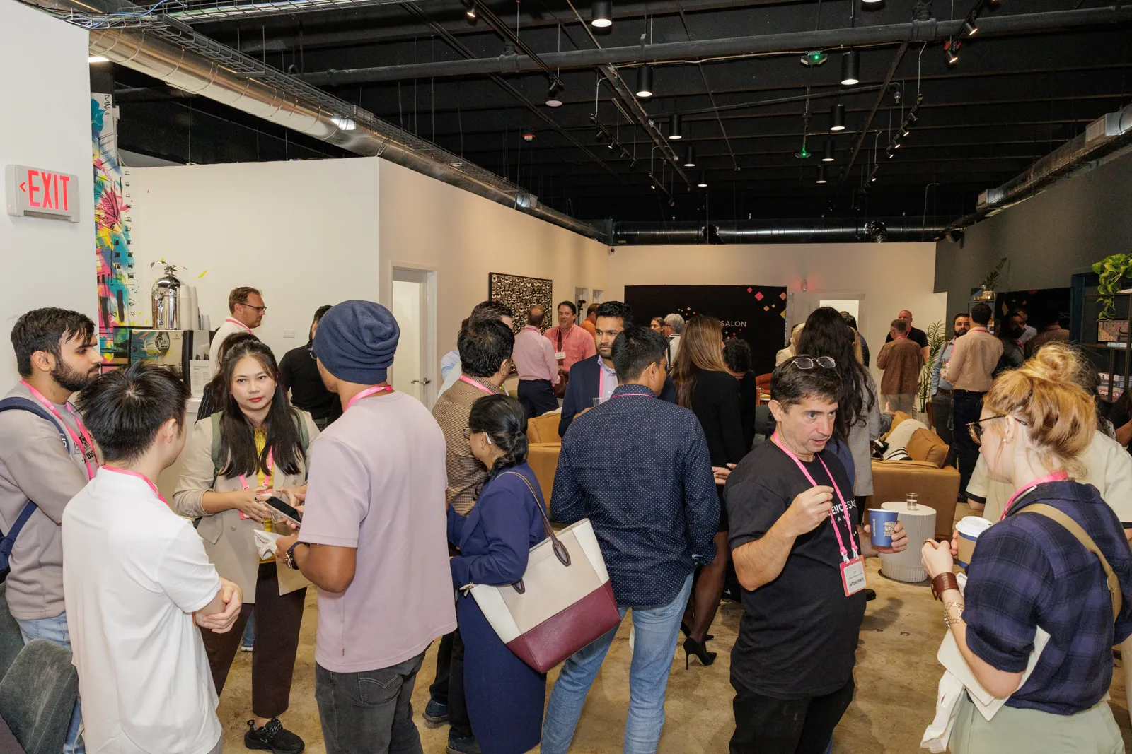 AI Loves Data attendees networking during an event reception.