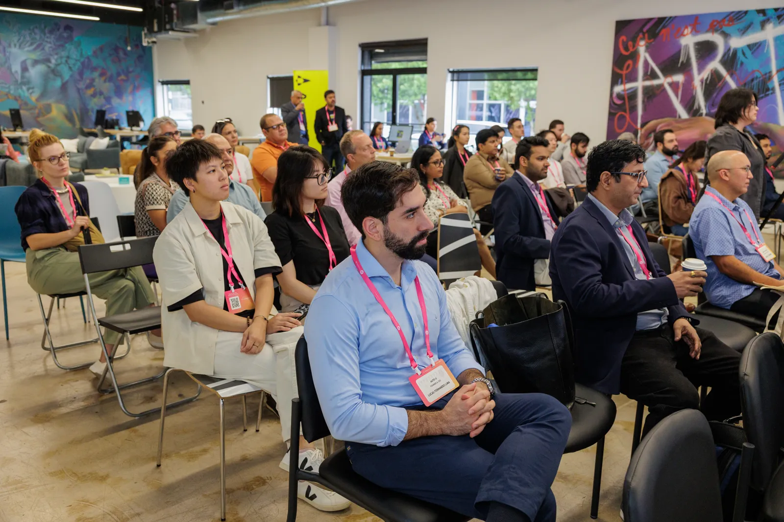 Audience gathered for an AI Loves Data conference presentation.